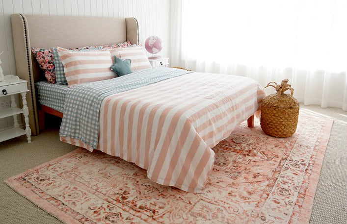 Best Ways to Lay an Area Rug Over Carpet