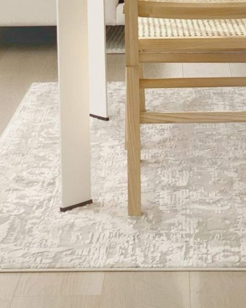 Adela Grey and Ivory Distressed Floral Rug