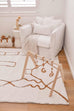 Alayna Cream and Gold Tribal Shag Rug