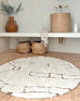 Alayna Cream and Gold Tribal Round Shag Rug