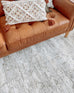 Eshe Grey and Ivory Distressed Floral Rug