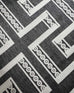 Teyona Charcoal and Ivory Tribal Flatweave Indoor Outdoor Rug