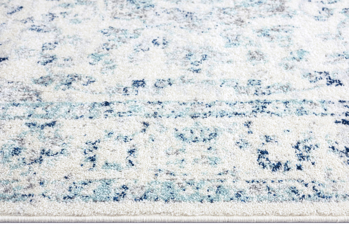Noor Blue and Ivory Traditional Distressed Rug