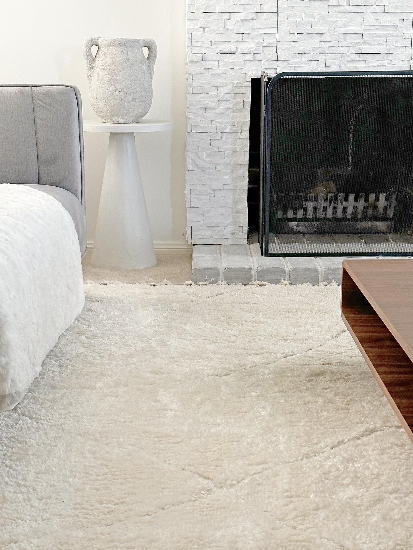 Calypso Ivory Cream Textured Tribal Tassel Rug