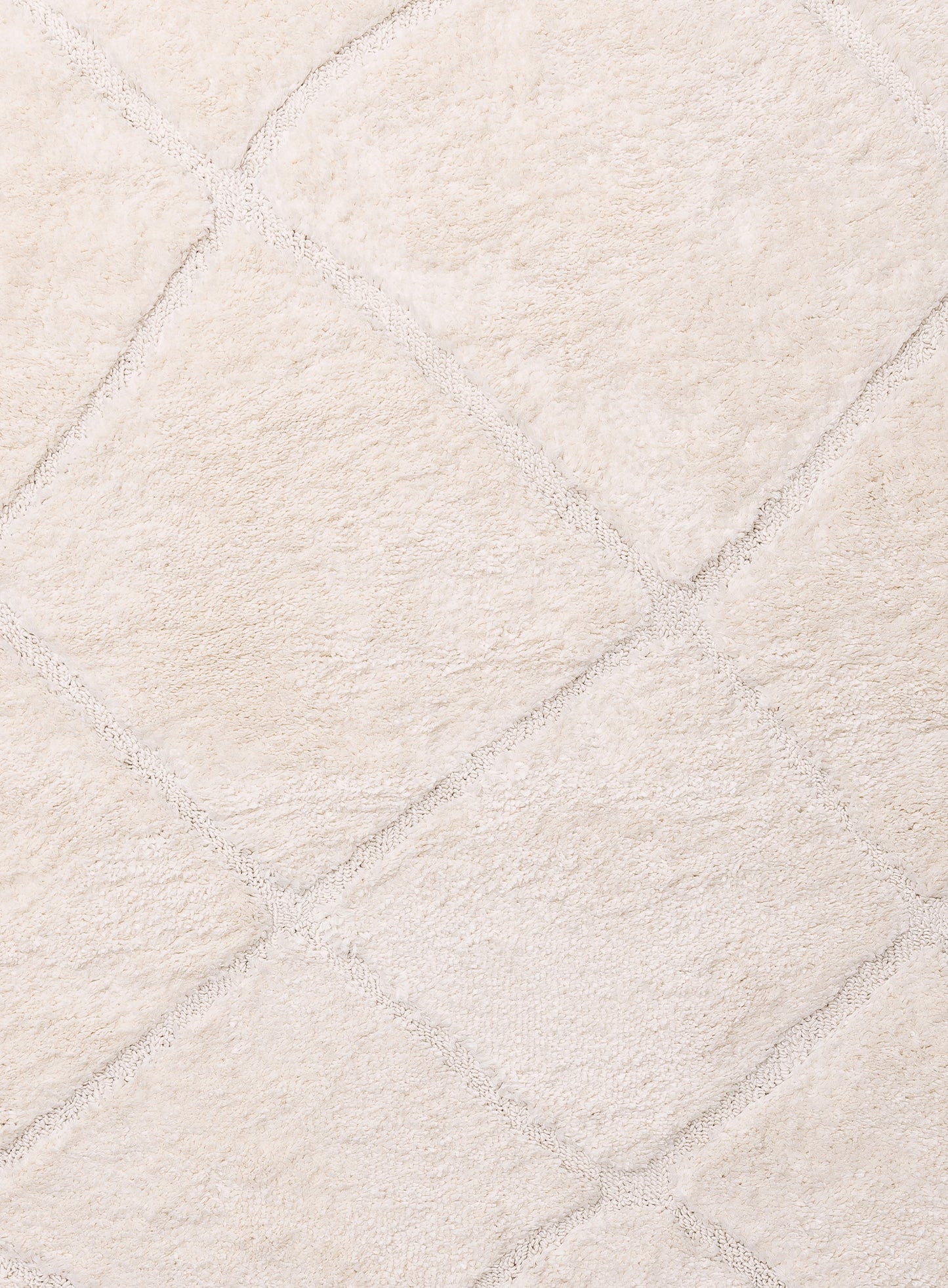 Calypso Ivory Cream Textured Tribal Tassel Rug