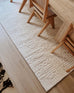 Kalinda Beige and Ivory Geometric Tribal Rug