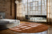 Lupe Terracotta Handwoven PET Round Rug