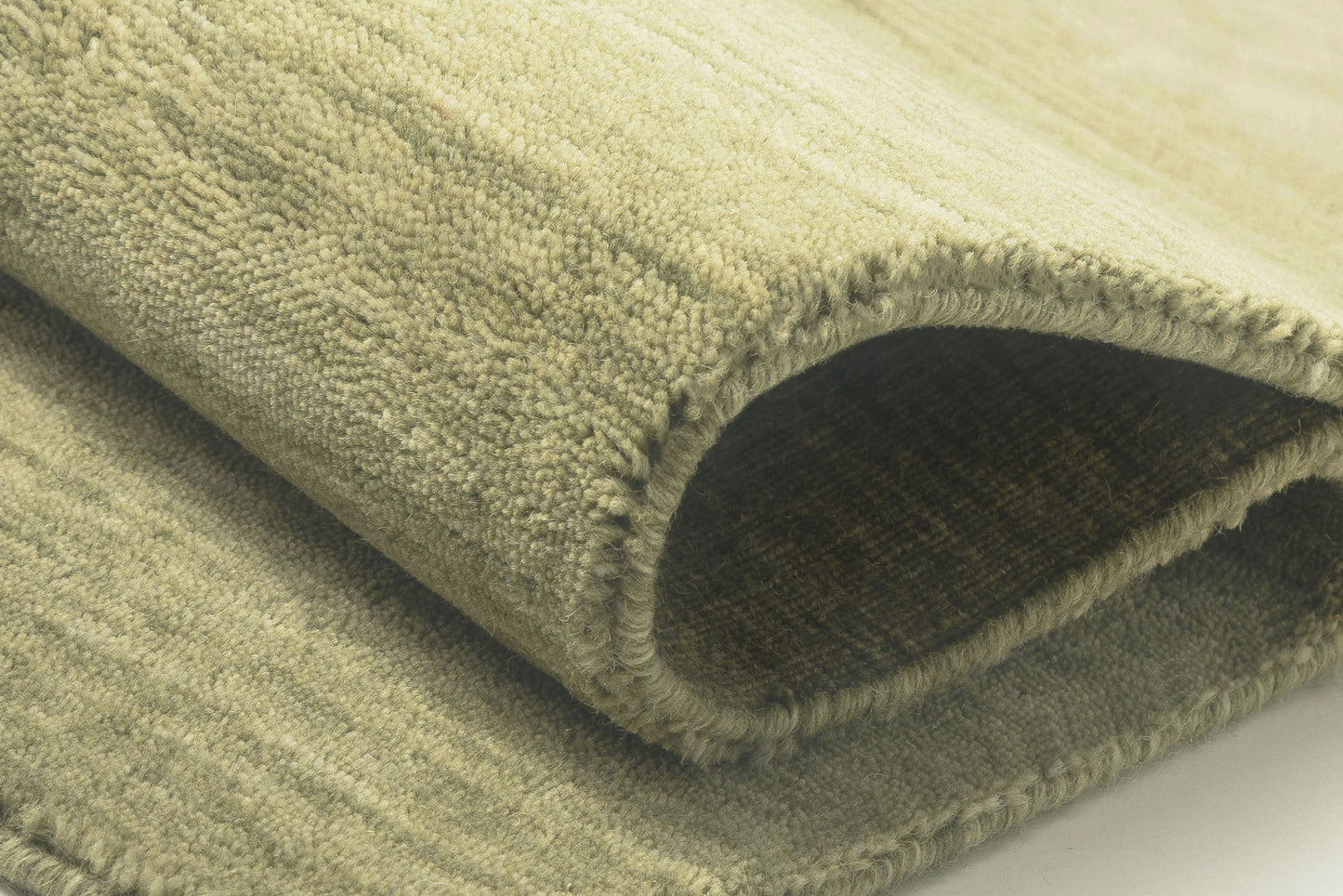 Nabila Earthy Green Solid Pile Wool Rug