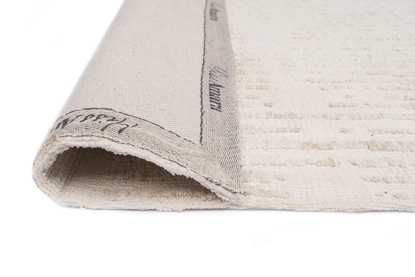 Nahba Ivory And Cream Textured Tribal Rug