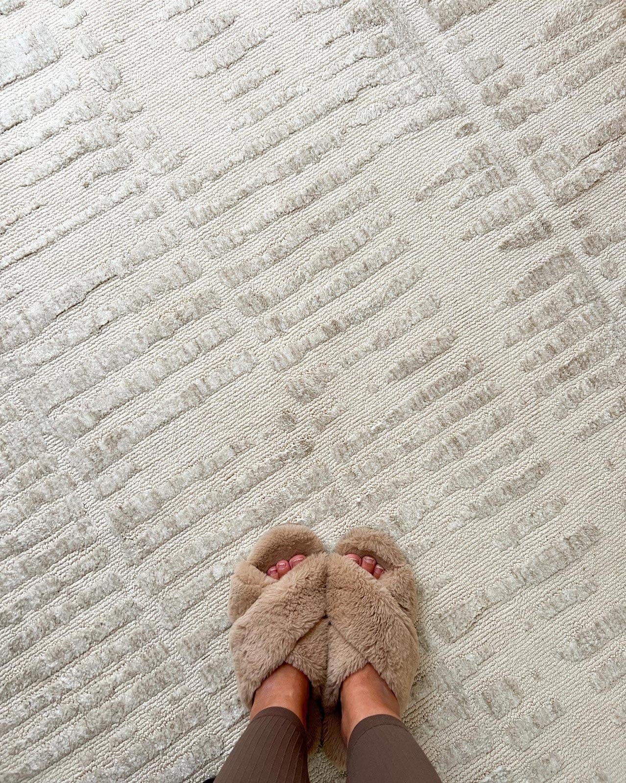 Nahba Ivory And Cream Textured Tribal Round Rug