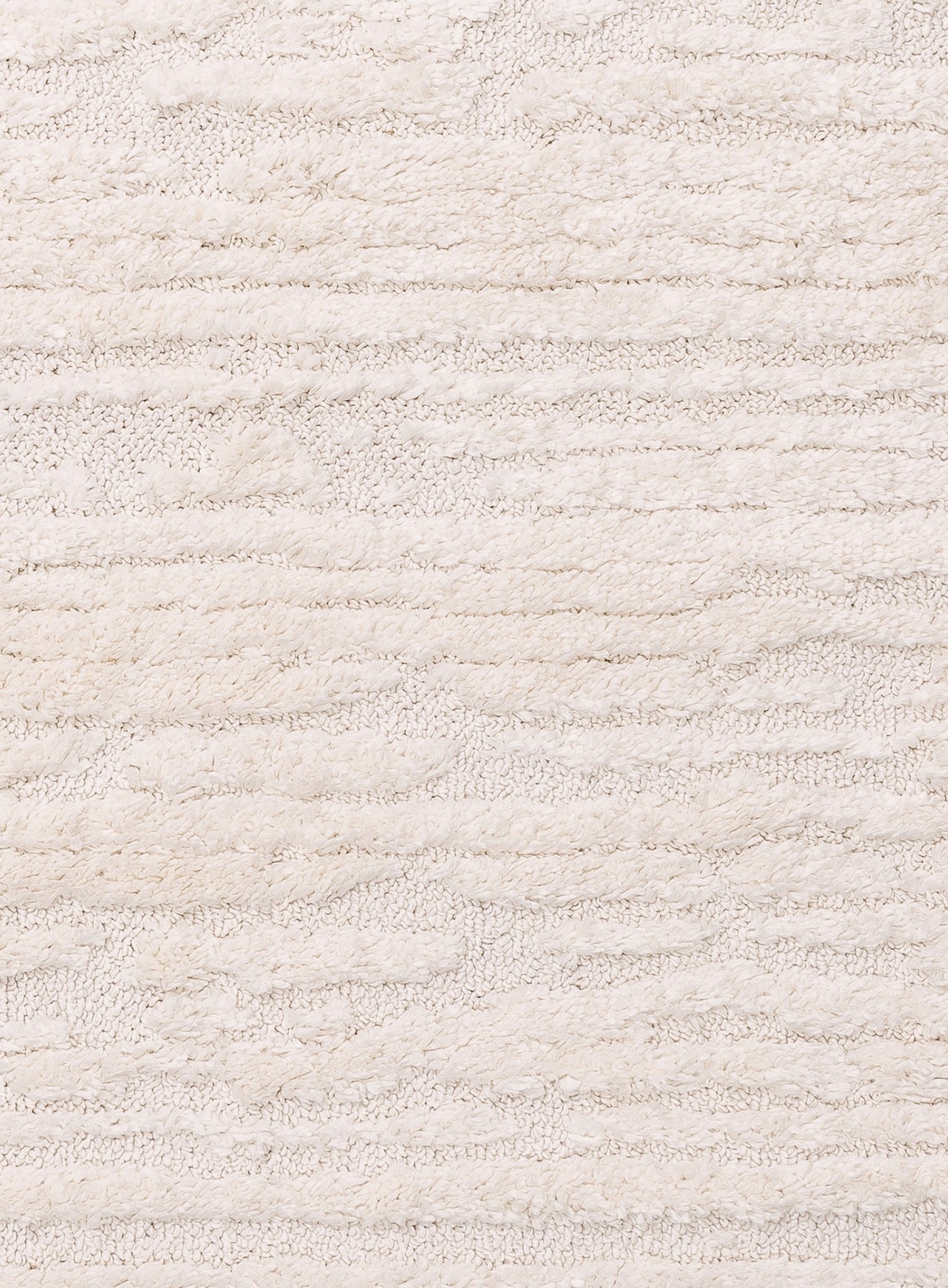 Serena Ivory Cream Textured Tassel Rug