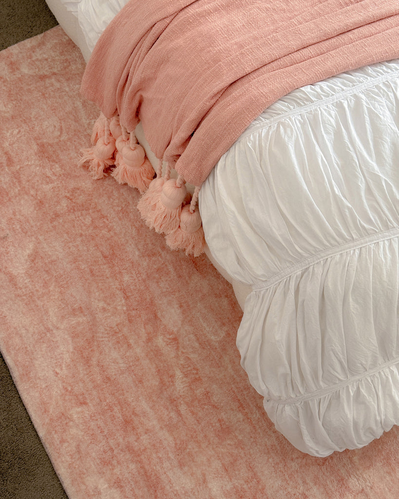 Tarquin Peach Pink Minimal Washable Rug